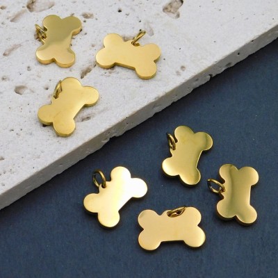 Zawieszka kość dla psa stal nierdzewna 15x10mm złota (1szt.)