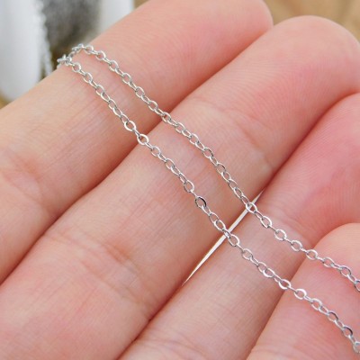 Łańcuszek ze stali chirurgicznej owal płaski 1.6x1.3mm ciemny srebrny 1metr