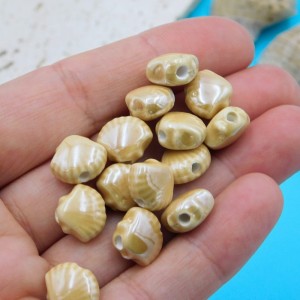 Koralik ceramiczny muszelka 12x10x6.5mm beżowy (1szt.)