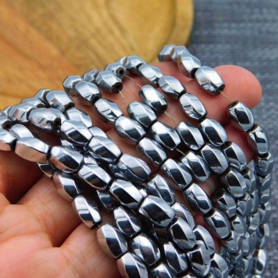 Koraliki Hematyt oliwki skręcone 8x5.5mm ciemne srebrne