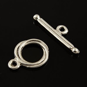 Ozdobne zapięcie metalowe koło 16x12.5mm ciemne srebrne (4kpl.)