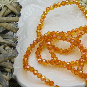 Oponki fasetowane ze szkła 4x3.5mm bursztynowe AB (110szt.)