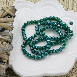 Oponki fasetowane ze szkła 4x3.5mm ciemno zielone z perłowym połyskiem (110szt.)