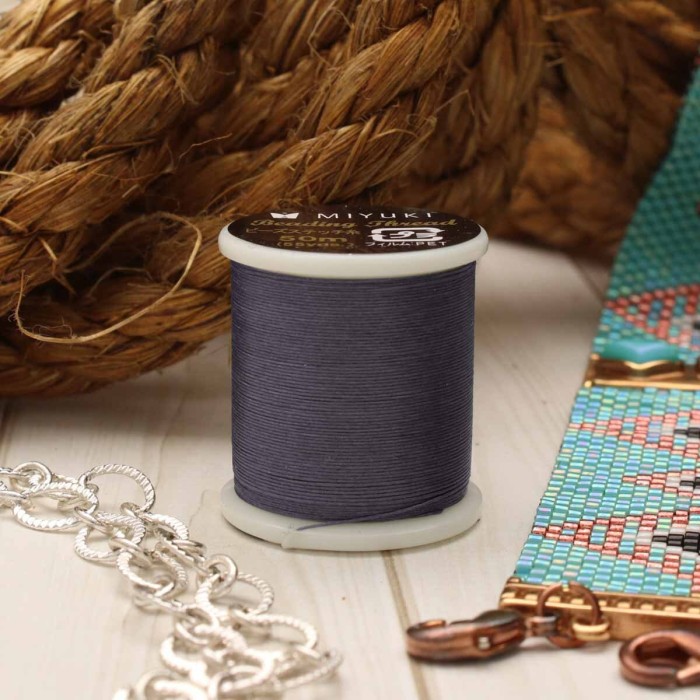 nici-miyuki-0-2mm-ciemny-grafit-stormy-blue-sutasz