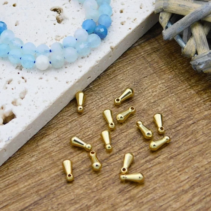 estetyczne-zakonczenie-przedluzki-zlota-kropelka-sopelek-stal