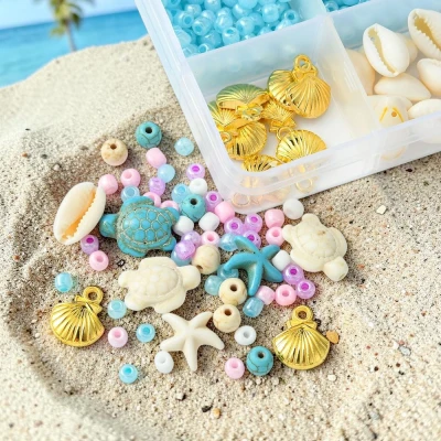 zlote-zawieszki-muszelki-kauri-do-bizuterii-handmade