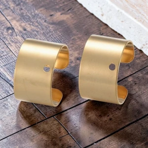 Nausznice gładkie zaciskowe z otworem 10x9mm stal chirurgiczna pozłacana (2szt.)