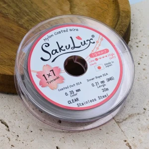 SakuLux japońska linka jubilerska stalowa powlekana nylonem 0.35mm 7-splotowa srebrna (szpula 30m)