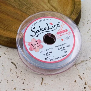 SakuLux japońska linka jubilerska stalowa powlekana nylonem 0.20mm 7-splotowa biała (szpula 30m)