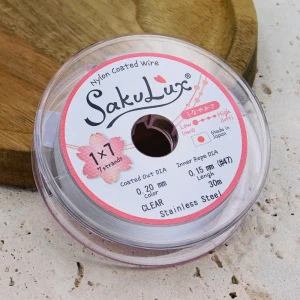 SakuLux japońska linka jubilerska stalowa powlekana nylonem 0.20mm 7-splotowa srebrna (szpula 30m)