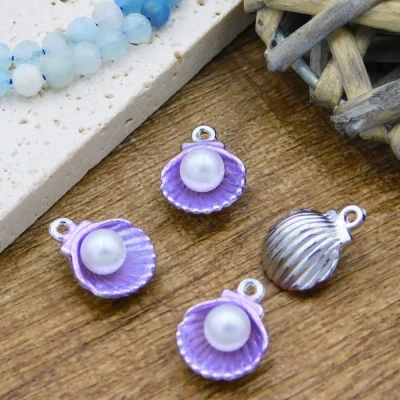 metalowa-muszla-fioletowa-perla-motywy-oceaniczne-diy