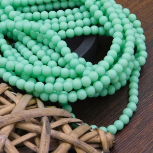 Miętowe koraliki szklane 6 mm kulki nieprzezroczyste do biżuterii Handmade (65szt.)