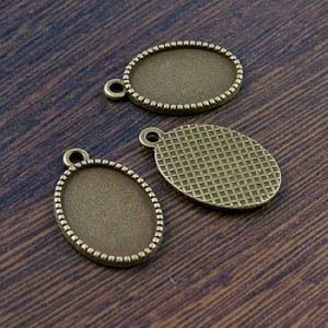 Baza metalowa do wklejania owalnych kaboszonów 18x13mm antyczny brąz (4szt.)