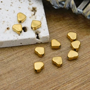 Złote serduszko przekładka gładka stal chirurgiczna pozłacana IP 7x6x3mm (1szt.)