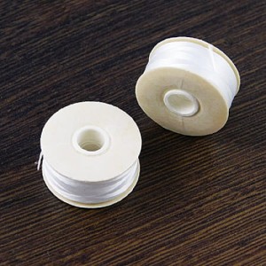 Białe nici nylonowe Nymo B 0.20mm do haftu koralikowego  (szpulka-66m)