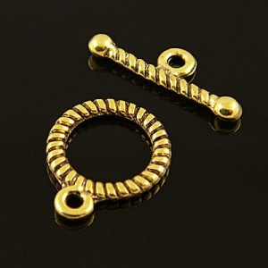 Zapięcie metalowe koło 16mmx12.5mm stare złoto (4kpl)