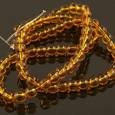 koraliki-szklane-4mm-bursztynowe-amber-przezroczyste