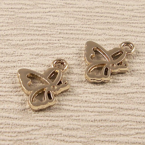 Zawieszka motylek z metalu 20x15mm różowe złoto (1szt.)