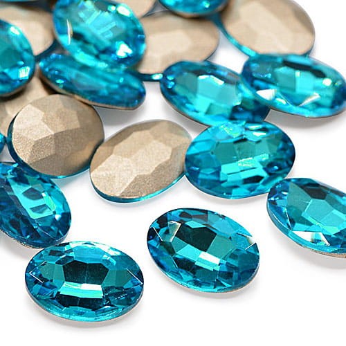 Kaboszon owal fasetowany ze szkła 18x13mm niebieski (1szt.)