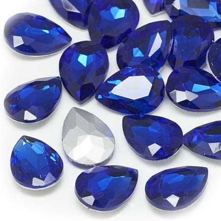 Kaboszon łza fasetowana ze szkła 25x18mm szafirowy (1szt.)