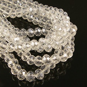Oponki fasetowane szklane 8x6mm przezroczyste z perłowym połyskiem (20szt.)