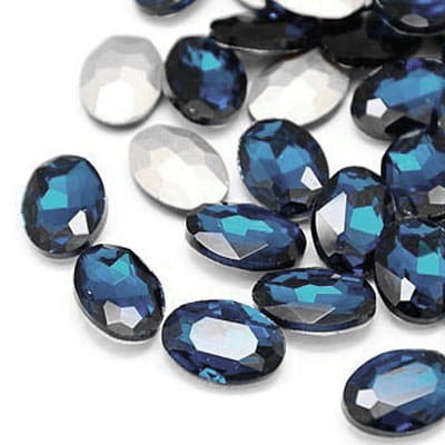 Kaboszon owal fasetowany ze szkła 25x18mm granatowy (1szt.)