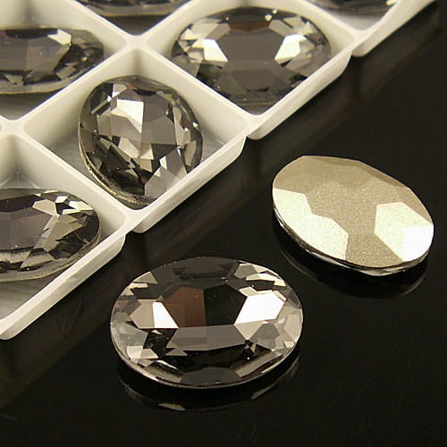 Kaboszon owal fasetowany ze szkła 18mmx13mm szary (1szt)