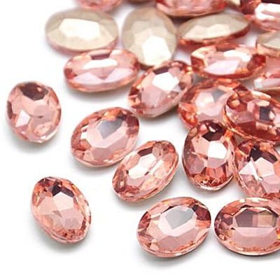 Kaboszon owal fasetowany ze szkła 18mmx13mm jasny brzoskwiniowy (1szt)