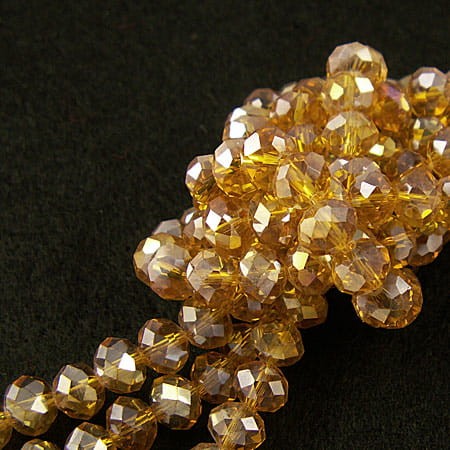 Oponki fasetowane ze szkła 8x6mm bursztynowe z połyskiem (20szt.)