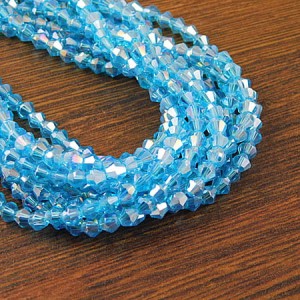 Kryształki bicone ze szkła 4mm niebieskie z połyskiem (75szt.)