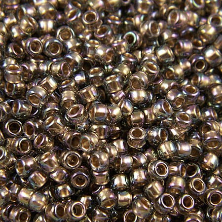 TOHO Round 8/0 Gold-Lined Rainbow Black Diamond (1op)