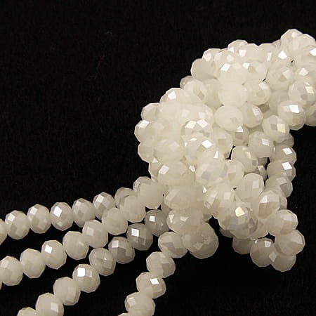 Oponki fasetowane ze szkła 6x4mm mleczne z połyskiem (20szt.)