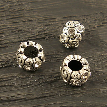 Przekładka z metalu z cyrkoniami 11mmx8mm ciemno srebrno-przezroczysta (1szt)