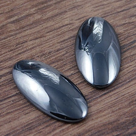 Kaboszon owal z hematytu 30x15mm grafitowy (1szt.)