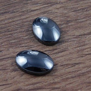 Kaboszon owal z hematytu 25mmx18mm grafitowy (1szt.)