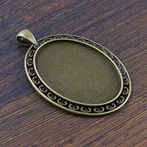 Baza z metalu do kaboszonów 40x30mm antyczny brąz (1szt)