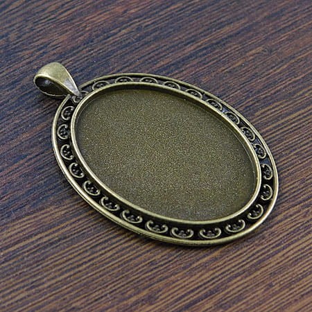 Baza z metalu do kaboszonów 40x30mm antyczny brąz (1szt)