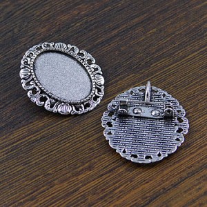 Baza broszki z metalu do kaboszonów 25x18mm antyczne srebro (1szt.)