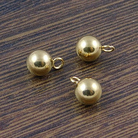 Zawieszka kulka stal nierdzewna 9x6mm złota (1szt.)
