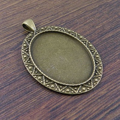 Baza z metalu do kaboszonów 40x30mm antyczny brąz (1szt.)