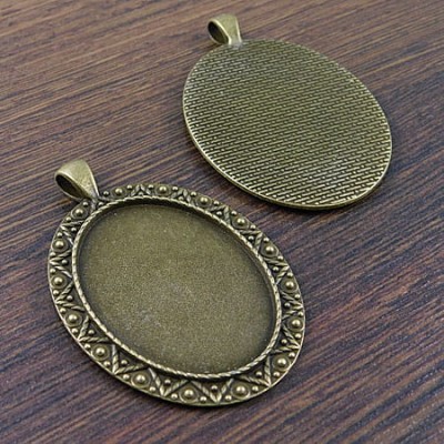 Baza z metalu do kaboszonów 40x30mm antyczny brąz (1szt.)