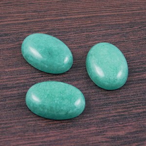 Kaboszon jadeit turkusowy owal 18-19x13x5.5mm (1szt)