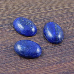 Kaboszon lapis lazuli owal 18-19x13x5.5mm (1szt.)