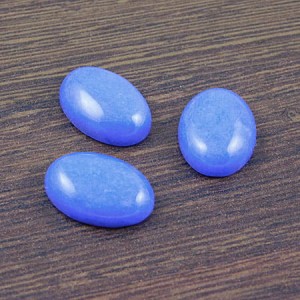 Kaboszon jadeit niebieski owal 18-19x13x5.5mm (1szt)