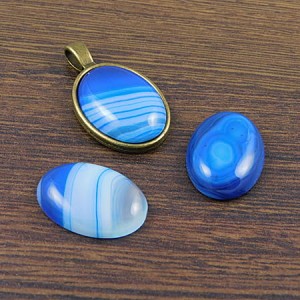 Kaboszon agat niebieski owal 25-26x18x5.5mm (1szt.)