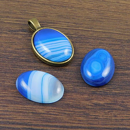 Kaboszon agat niebieski owal 25-26x18x5.5mm (1szt.)