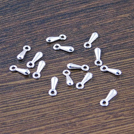 Zawieszka, końcówka łańcuszka sopelek z metalu 7x2mm srebrna (50szt)