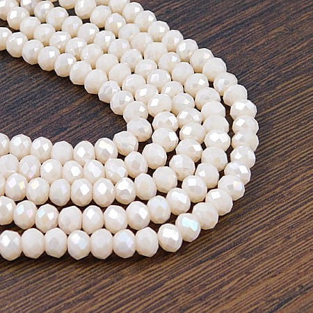 Oponki fasetowane ze szkła 6x4.5mm beżowe z połsykiem (20szt.)