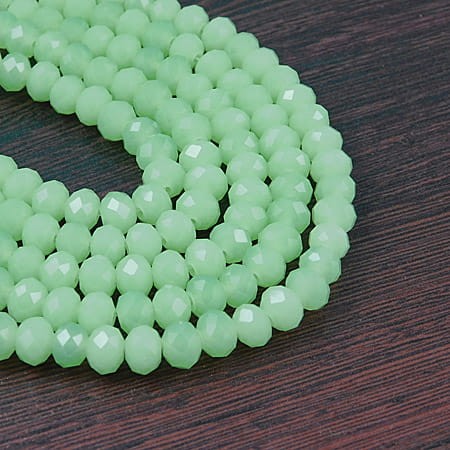 Oponki fasetowane ze szkła 8x6mm jasne zielone (20szt)