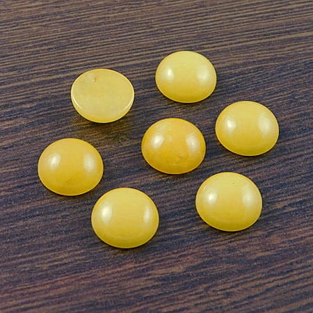 Kaboszon jadeit żółty koło 12x5mm (1szt)